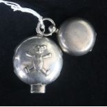 A late Victorian silver sovereign case and a later child's silver rattle (parts missing).