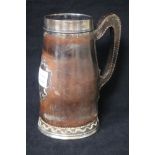 A silver mounted leather "blackjack" tankard, import marks for Gorham Manufacturing Co,