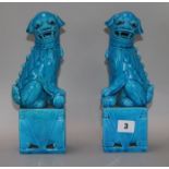 A pair of Chinese blue-glazed Buddhist lion figures 26.5cm