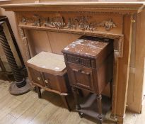 A pine and carved applied wood fire surround W.174cm