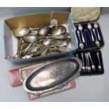 A collection of silver and plated flatware