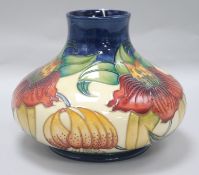 A Moorcroft 'Anna Lily' vase, by Nicola Slaney, of squat baluster form, dated '98', with original