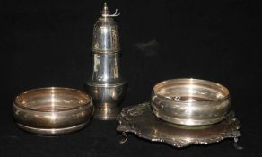 A small circular silver waiter with shaped anthemion-cast rim, a silver sugar caster and a pair of