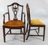 A set of eight George III Hepplewhite style mahogany dining chairs, including two carvers, with