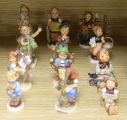 Twelve Goebel Hummel figures of children, to include 'Serenade', 'Happy Pastime', 'Apple Tree