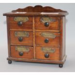 A 19th century spice cabinet 18cm. H.19cm.