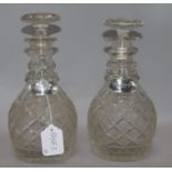 A pair of 19th century decanters and silver labels 27cm