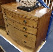 A Regency mahogany bow-fronted four-drawer chest with moulded caddy top 99cm.