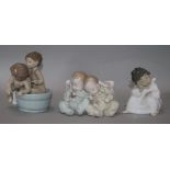 Three Lladro figures, including 'Little Dreamers', 5772, 'Bath Time', 6411 and 'Thinking', 4539