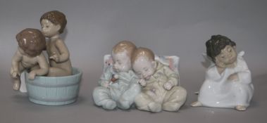 Three Lladro figures, including 'Little Dreamers', 5772, 'Bath Time', 6411 and 'Thinking', 4539