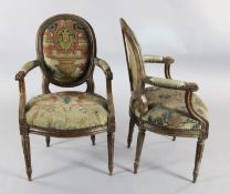 A set of six Louis XVI style stained beech fauteuils, with foliate tapestry woven upholstery, part