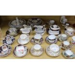 A collection of 19th century porcelain tea wares including a tea cup and saucer