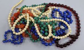 A Collection of bead necklaces, including malachite, ivory, lapis lazuli, cornelian etc.