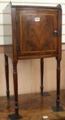 A small mahogany bowfront bedside cupboard W.36cm