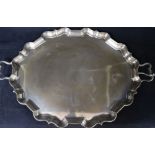 A George V silver two handled shaped oval silver tea tray, Thomas Bradbury & Sons, London, 1924,
