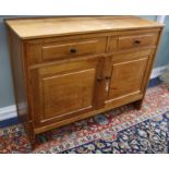 A Gordon Russell Ltd, Broadway, Worcestershire plain oak sideboard, fitted 2 drawers over fielded