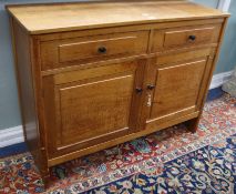A Gordon Russell Ltd, Broadway, Worcestershire plain oak sideboard, fitted 2 drawers over fielded