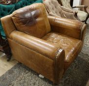 A large brown leather armchair
