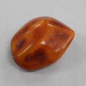 A free form piece of raw amber, gross weight 112 grams, 82mm.