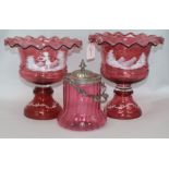 A near pair of 20th century Mary Gregory style cranberry glass pedestal bowls, each with frilled
