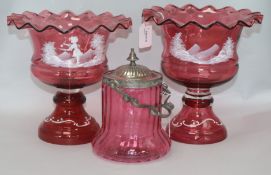 A near pair of 20th century Mary Gregory style cranberry glass pedestal bowls, each with frilled