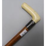 An ivory and silver mounted malacca walking stick 91cm