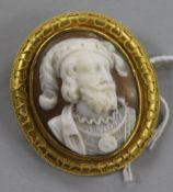 A Victorian gold framed oval cameo brooch carved with the bust of an Italian gentleman, 40mm.