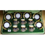 A cased Limoges tea set with silver cup holders