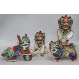 Four Shiwan pottery lion figures H.26cm