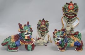 Four Shiwan pottery lion figures H.26cm