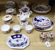 A collection of Gaudy Welsh tableware, including a two-handled pot and cover, a jug, cups,