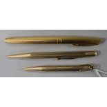 A Waterman gold plated fountain pen with 18ct gold nib and 2 propelling pencils