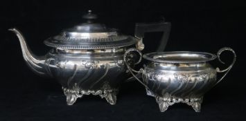 A George V embossed silver teapot and sugar bowl, by Henry Matthews, Birmingham, 1916, gross 28.5