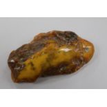A free form piece of raw amber, gross weight 222 grams, 15.3cm.