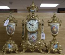 A Franz Hermle modern gilt metal and porcelain clock garniture, with Sevres style decoration and