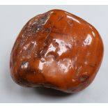A large piece of raw amber, gross weight 1636 grams, height 11cm.