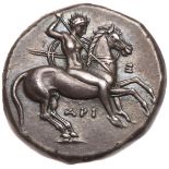 Calabria, Taras. Silver Nomos (7.85 g), ca. 315-302 BC. Ari., X., and Kl., magistrates. Nude