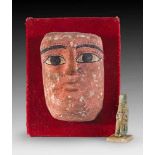 Kleine Mumienmaske und ein Amulett. a) H 10cm. Holz, überzogen mit stuckierter Leinwand und