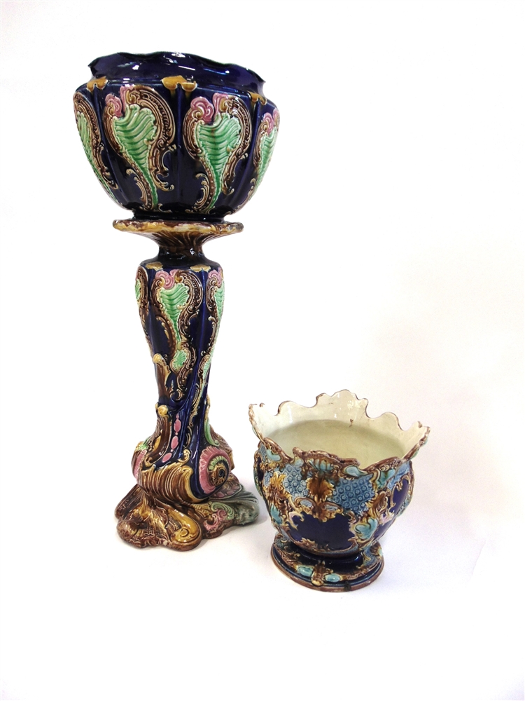 A VICTORIAN CERAMIC JARDINIERE ON STAND 86cm high, together with another jardiniere