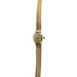 EMKA, A LADIES MECHANICAL WRIST WATCH the case stamped '18K' over '750', on a milanese bracelet