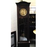 A GUSTAV BECKER TRIPLE WEIGHT LONGCASE CLOCK with Westminster chiming movement stamped to reverse