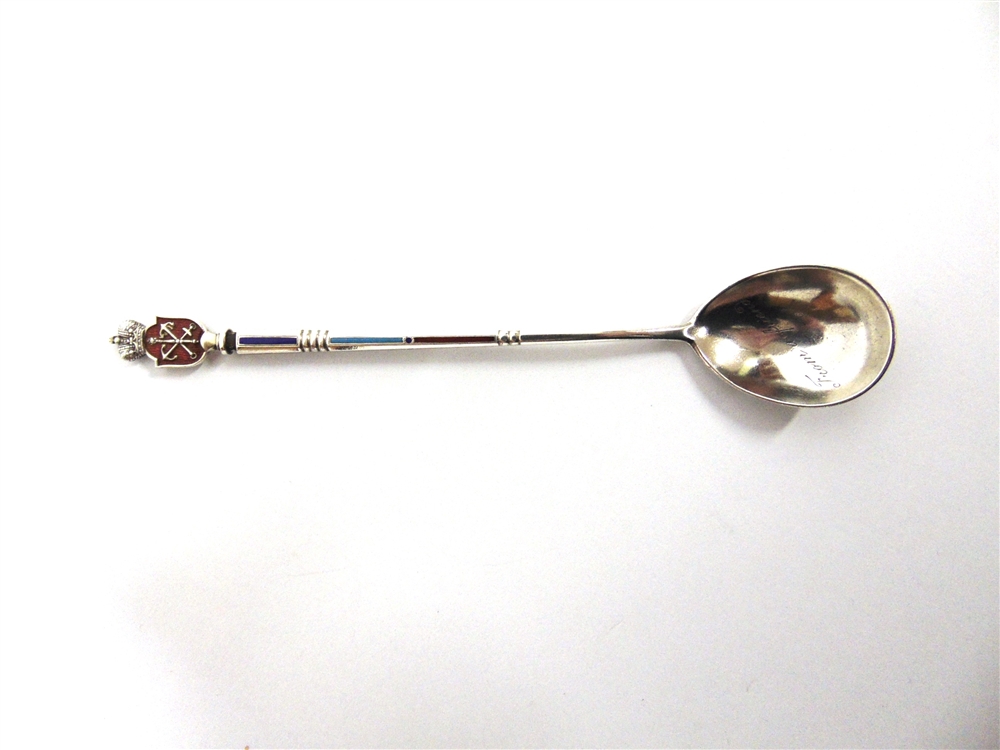 A RUSSIAN ENAMELLED SPOON Cyrillic makers mark, untraced and droinik mark for St Petersburg 1882-