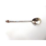 A RUSSIAN ENAMELLED SPOON Cyrillic makers mark, untraced and droinik mark for St Petersburg 1882-