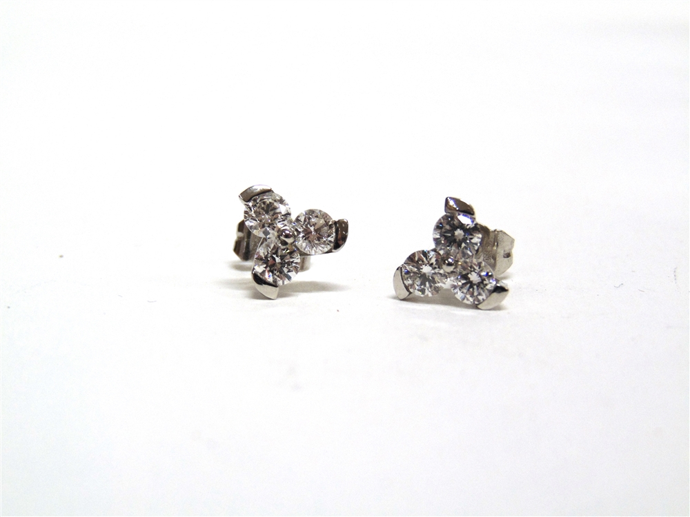 A PAIR OF THREE STONE DIAMOND EARSTUDS of trefoil design, the six modern brilliant cuts totalling - Image 2 of 2