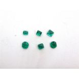 A COLLECTION OF SIX LOOSE FACETTED EMERALDS approximately 2 carats total