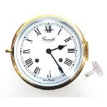 A BRASS CASED 8-DAY SHIPS CLOCK the enamel dial with Roman numerals inscribed 'Grenoble London',
