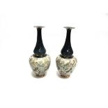 A PAIR OF DOULTON SLATERS TALL VASES with floral decoration, 42.5cm high