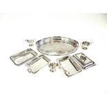 AN OVAL PLATED GALLERY TRAY 62cm long; a pair of entre dishes; and other items