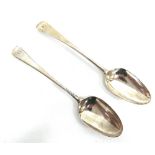 A MATCHED PAIR OF GEORGE III SILVER TABLESPOONS both London 1775, different maker, feather edge