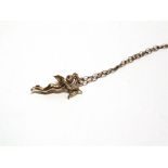 A 9 CARAT GOLD CUPID CHARM ON A CHAIN 6.7g gross.